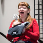 Puppeteer Stacey Gordon laughing at closing ceremonies of Capricon 36