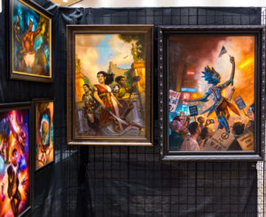 A display of Capricon 36 Artist Guest of Honor Eric Wilkerson's art in the Art Show