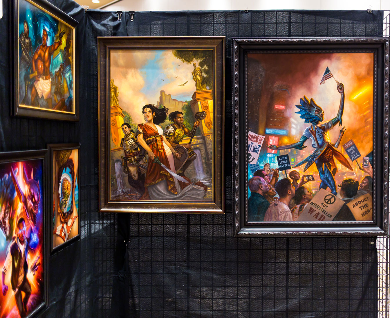 A display of Capricon 36 Artist Guest of Honor Eric Wilkerson's art in the Art Show